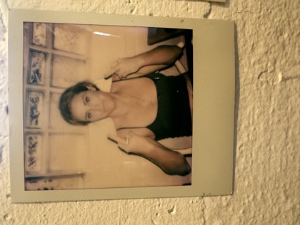 A member at The Den, on Polaroid